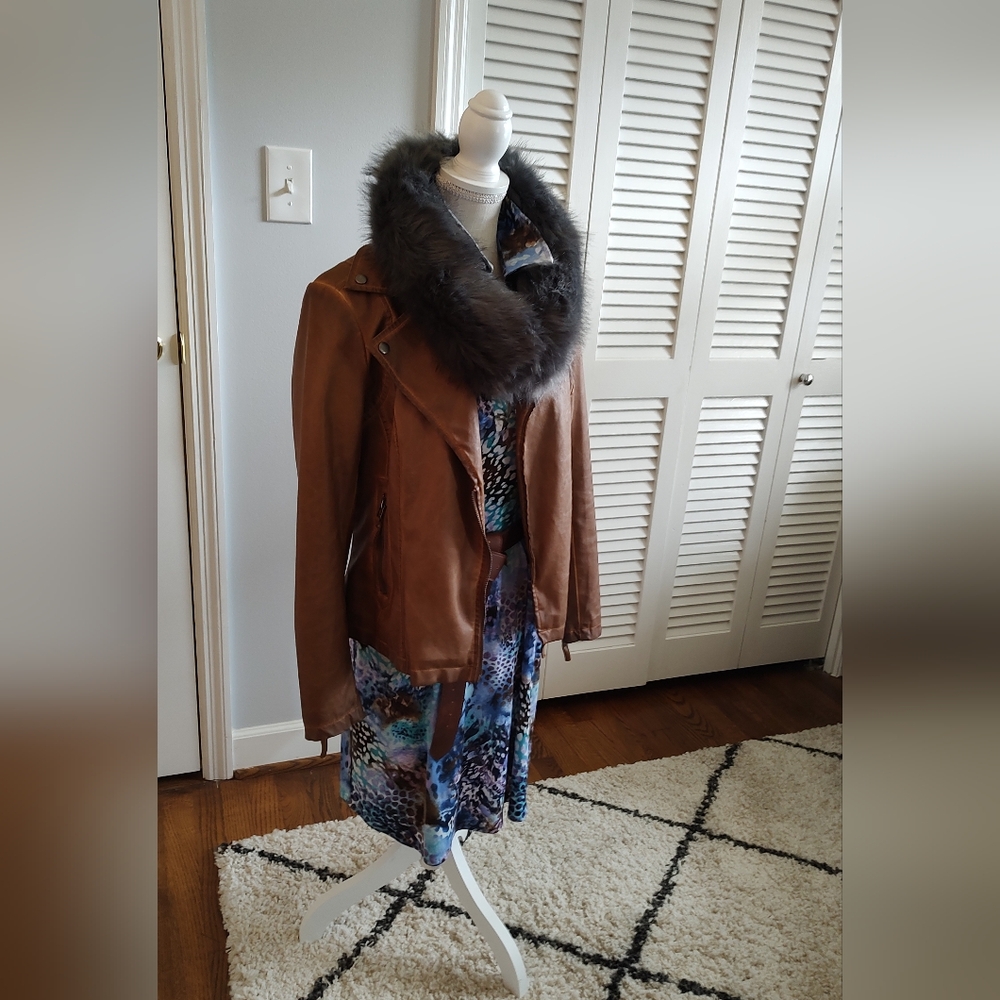 Brown leather jacket. Blue patterned dress. Furry blue collar. Size small
